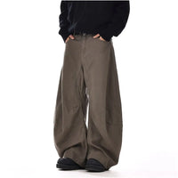 RETRO DECONSTRUCTED CURVED LEG JEANS