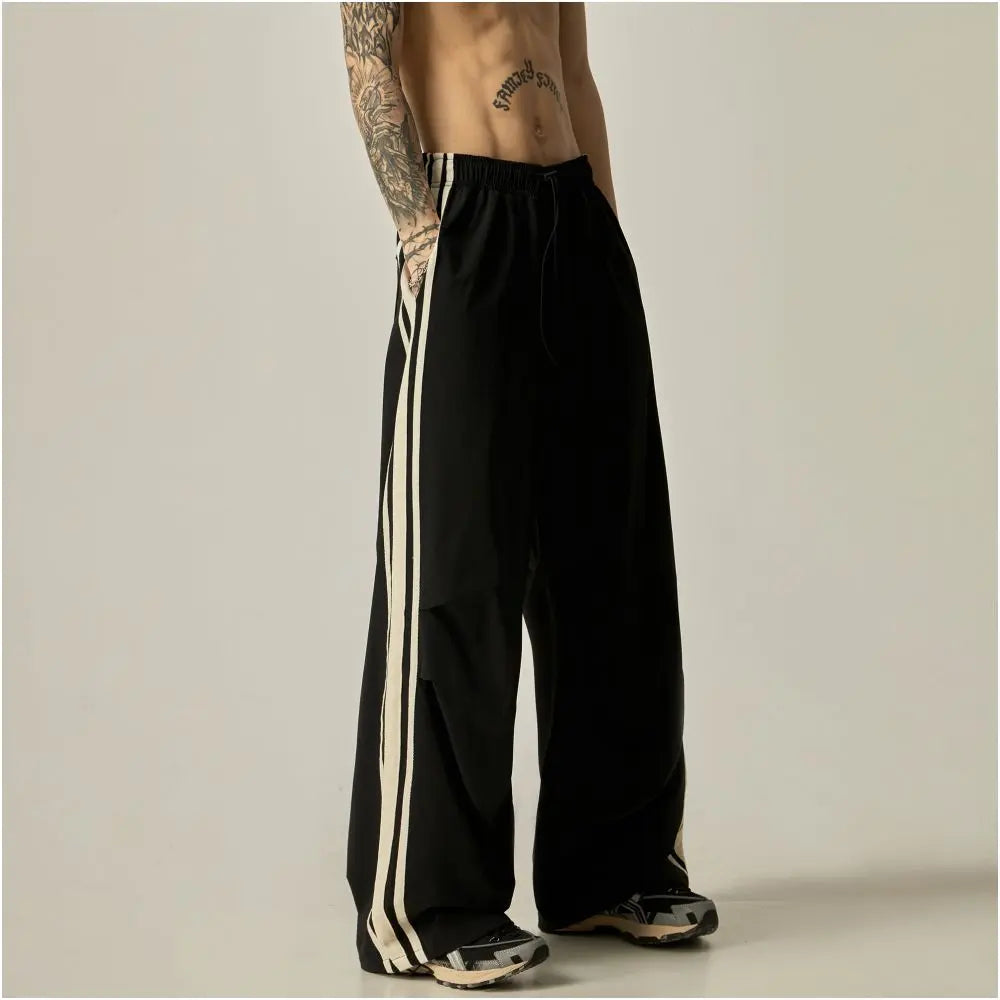ISIETS American retro drape lazy style striped quick drying pants men s summer paratrooper pants loose wide leg casual pants image 5