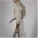 Black ironless long sleeved shirt for men with a Korean style high end feel and vertical stripes It has a light and mature texture with a hanging down feel It is a business casual shirt image 5