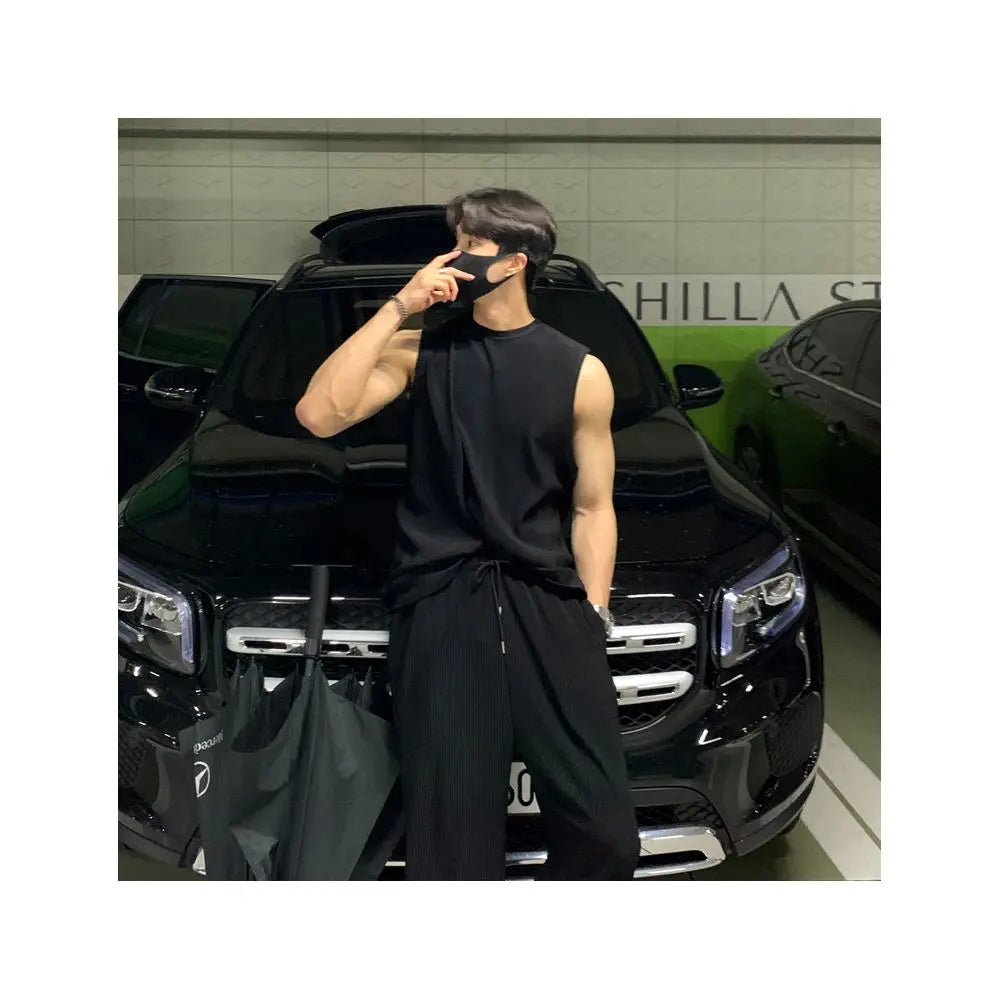 SLEEVELESS VEST AND TROUSERS SET