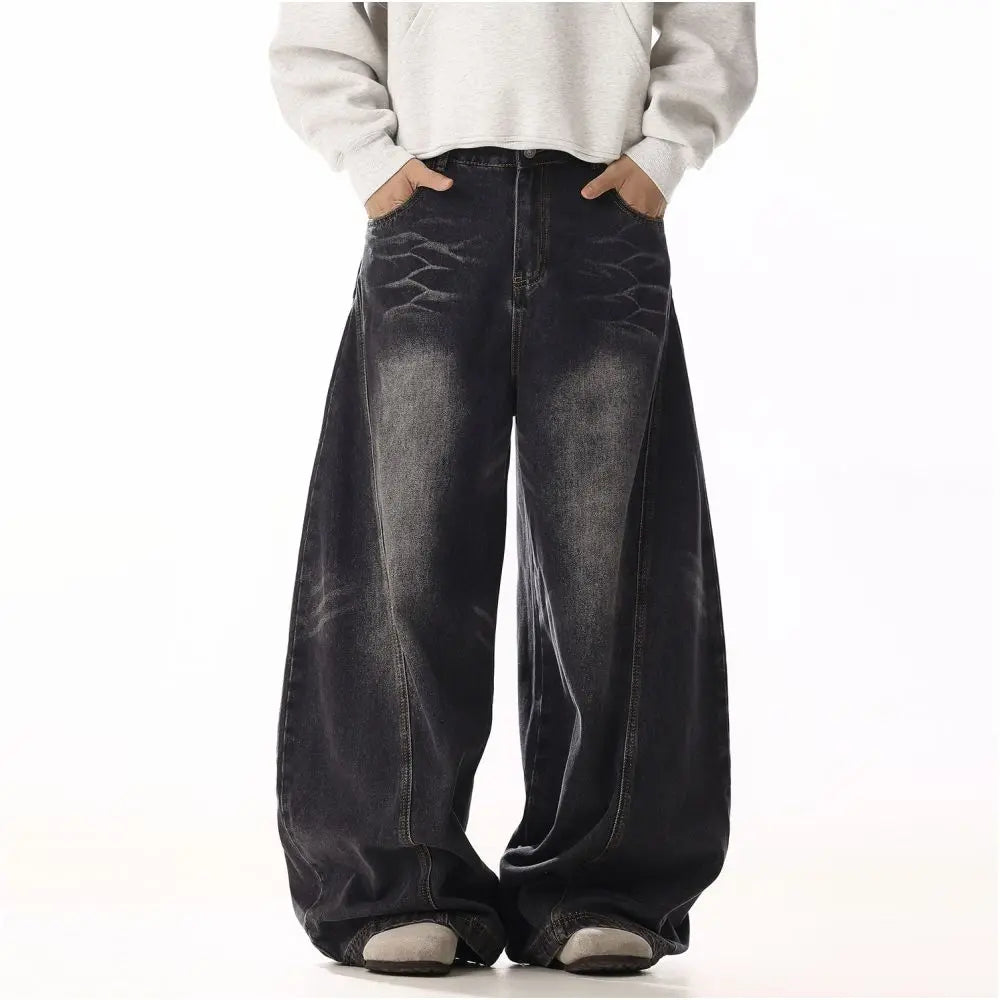 RETRO CAT-WHISKER CURVED-LEG WIDE JEANS