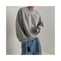 LOOSE FITING LONG SLEEVED PULLOVER TOP