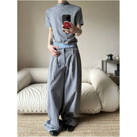 PLEATED PLAID STRAIGHT LEG WIDE FIT TROUSERS