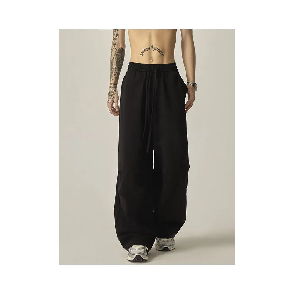 LOOSE FIT WIDE LEG PARACHUTE PANTS ISIETS